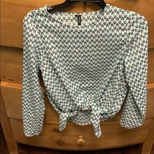 blue and white patterned tie-front blouse
